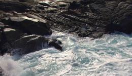 Water lapping at rocky shore